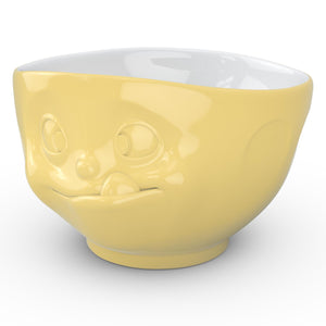 16 ounce capacity porcelain bowl in yellow featuring a sculpted ‘tasty’ facial expression. From the TASSEN product family of fun dishware by FIFTYEIGHT Products. Quality bowl perfect for serving cereal, soup, snacks and much more.