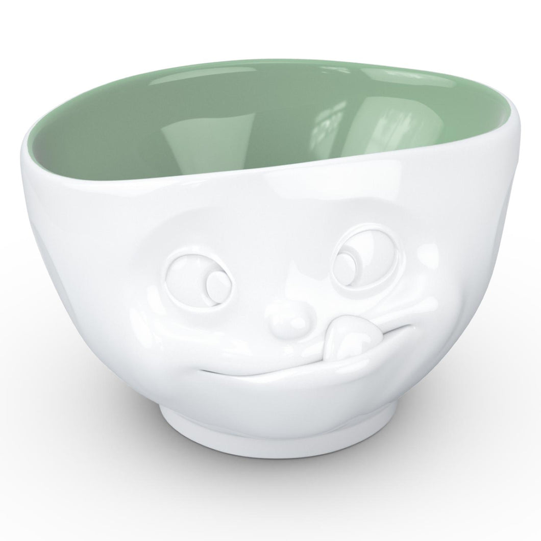 16 ounce capacity porcelain bowl in white with pine color inside featuring a sculpted ‘tasty’ facial expression. From the TASSEN product family of fun dishware by FIFTYEIGHT Products. Quality bowl perfect for serving cereal, soup, snacks and much more.