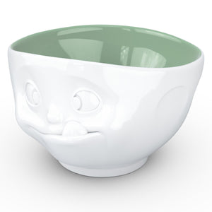 16 ounce capacity porcelain bowl in white with pine color inside featuring a sculpted ‘tasty’ facial expression. From the TASSEN product family of fun dishware by FIFTYEIGHT Products. Quality bowl perfect for serving cereal, soup, snacks and much more.