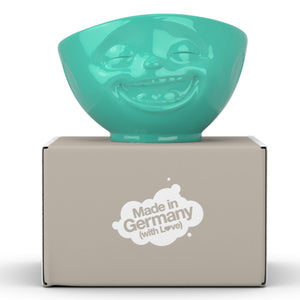 16 ounce capacity porcelain bowl in mint color featuring a sculpted ‘laughing’ facial expression. From the TASSEN product family of fun dishware by FIFTYEIGHT Products. Quality bowl perfect for serving cereal, soup, snacks and much more.