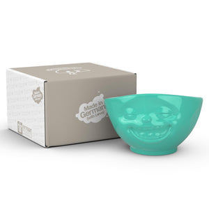 16 ounce capacity porcelain bowl in mint color featuring a sculpted ‘laughing’ facial expression. From the TASSEN product family of fun dishware by FIFTYEIGHT Products. Quality bowl perfect for serving cereal, soup, snacks and much more.