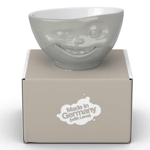 Premium porcelain bowl in grey color from the TASSEN product family of fun dishware by FIFTYEIGHT Products. Offers 16 oz capacity perfect for serving cereal, soup, snacks and much more. Dishwasher and microwave safe bowl featuring a sculpted ‘winking’ facial expression. Shipped in exclusively designed gift box.