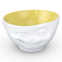 Load image into Gallery viewer, Premium porcelain bowl in white with Saffron Color Inside from the TASSEN product family of fun dishware by FIFTYEIGHT Products. Offers 16 oz capacity perfect for serving cereal, soup, snacks and much more. Dishwasher and microwave safe bowl featuring a sculpted ‘winking’ facial expression. Shipped in exclusively designed gift box.
