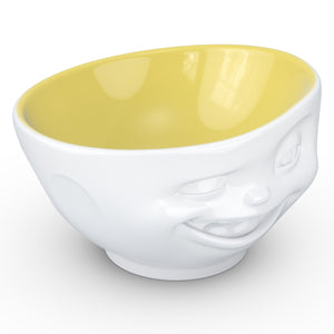 Premium porcelain bowl in white with Saffron Color Inside from the TASSEN product family of fun dishware by FIFTYEIGHT Products. Offers 16 oz capacity perfect for serving cereal, soup, snacks and much more. Dishwasher and microwave safe bowl featuring a sculpted ‘winking’ facial expression. Shipped in exclusively designed gift box.