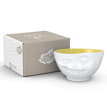 Load image into Gallery viewer, Premium porcelain bowl in white with Saffron Color Inside from the TASSEN product family of fun dishware by FIFTYEIGHT Products. Offers 16 oz capacity perfect for serving cereal, soup, snacks and much more. Dishwasher and microwave safe bowl featuring a sculpted ‘winking’ facial expression. Shipped in exclusively designed gift box.
