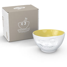 Load image into Gallery viewer, Premium porcelain bowl in white with Saffron Color Inside from the TASSEN product family of fun dishware by FIFTYEIGHT Products. Offers 16 oz capacity perfect for serving cereal, soup, snacks and much more. Dishwasher and microwave safe bowl featuring a sculpted ‘winking’ facial expression. Shipped in exclusively designed gift box.
