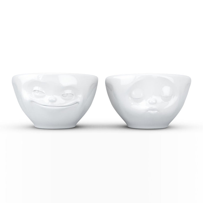 Set of two 3.3 oz. bowls in white featuring sculpted 'grinning' and 'kissing' faces. From the TASSEN product family of fun dishware by FIFTYEIGHT Products. Quality bowl perfect for serving dips, sauces, nuts, sugar, spices, espresso, jam, marmalade, honey, and more.