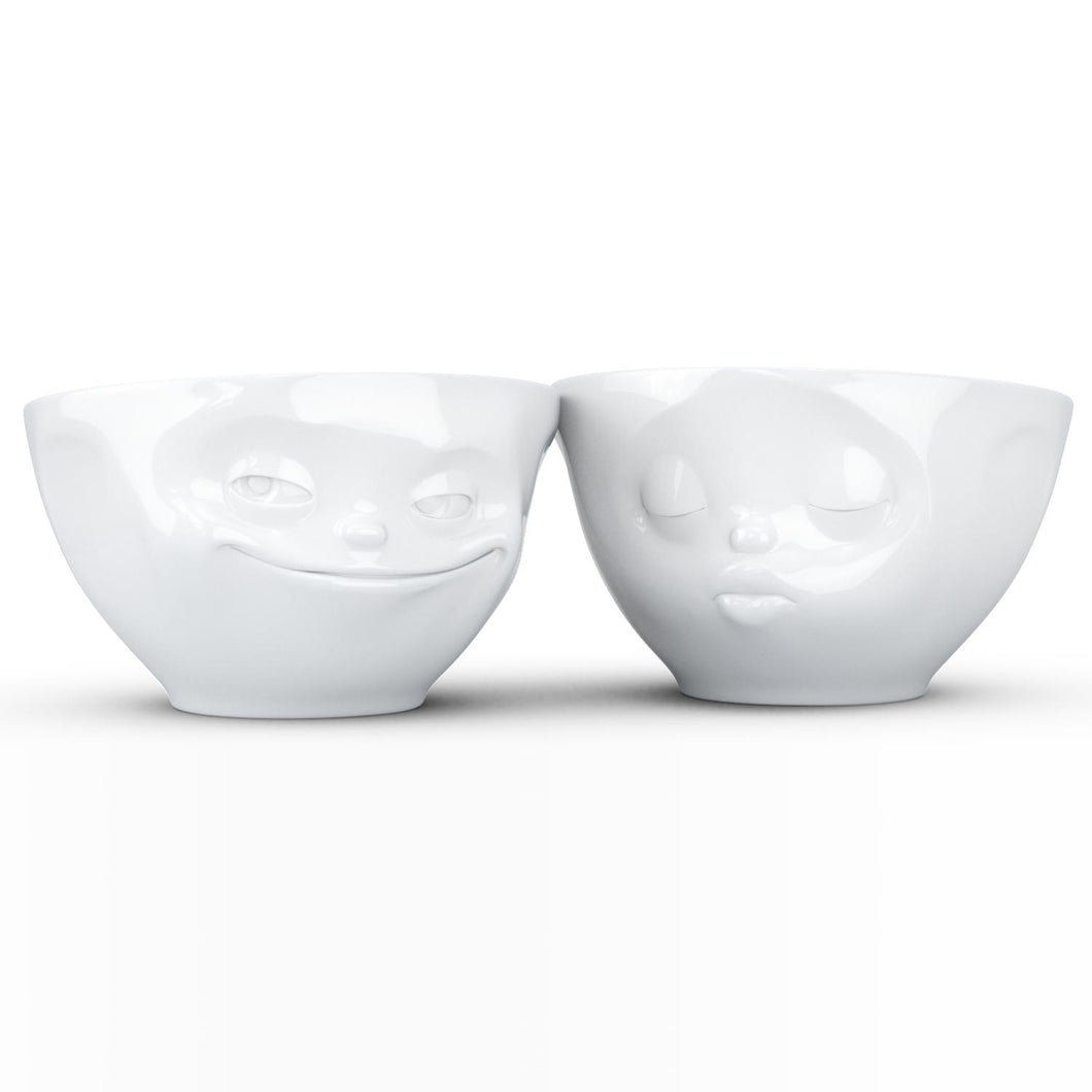 Set of two 6.5 oz. bowls in white featuring a sculpted ‘grinning’ and 'kissing' faces. From the TASSEN product family of fun dishware by FIFTYEIGHT Products. Quality bowl perfect for serving snacks, nuts, chips, dips, sauces, and a few scoops of ice cream.