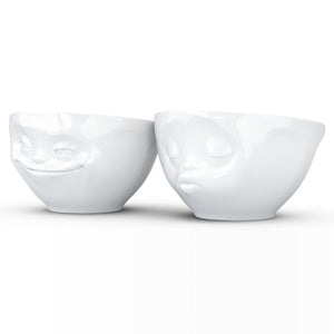 Set of two 6.5 oz. bowls in white featuring a sculpted ‘grinning’ and 'kissing' faces. From the TASSEN product family of fun dishware by FIFTYEIGHT Products. Quality bowl perfect for serving snacks, nuts, chips, dips, sauces, and a few scoops of ice cream.