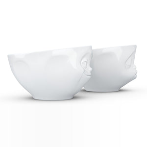 Set of two 6.5 oz. bowls in white featuring a sculpted ‘grinning’ and 'kissing' faces. From the TASSEN product family of fun dishware by FIFTYEIGHT Products. Quality bowl perfect for serving snacks, nuts, chips, dips, sauces, and a few scoops of ice cream.