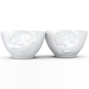 Set of two 6.5 oz. bowls in white featuring a sculpted ‘happy’ and 'Oh please' faces. From the TASSEN product family of fun dishware by FIFTYEIGHT Products. Quality bowl perfect for serving snacks, nuts, chips, dips, sauces, and a few scoops of ice cream.