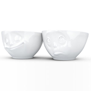 Set of two 6.5 oz. bowls in white featuring a sculpted ‘happy’ and 'Oh please' faces. From the TASSEN product family of fun dishware by FIFTYEIGHT Products. Quality bowl perfect for serving snacks, nuts, chips, dips, sauces, and a few scoops of ice cream.