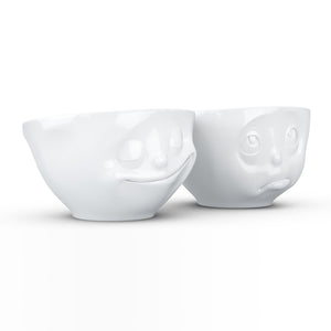 Set of two 6.5 oz. bowls in white featuring a sculpted ‘happy’ and 'Oh please' faces. From the TASSEN product family of fun dishware by FIFTYEIGHT Products. Quality bowl perfect for serving snacks, nuts, chips, dips, sauces, and a few scoops of ice cream.