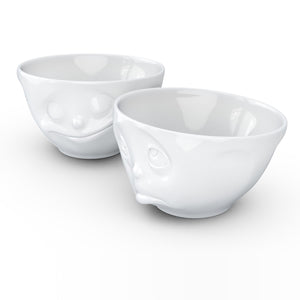 Set of two 6.5 oz. bowls in white featuring a sculpted ‘happy’ and 'Oh please' faces. From the TASSEN product family of fun dishware by FIFTYEIGHT Products. Quality bowl perfect for serving snacks, nuts, chips, dips, sauces, and a few scoops of ice cream.