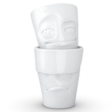 Load image into Gallery viewer, Set of two coffee mugs with &#39;Grumpy&#39; and &#39;Impish&#39; facial expression and 11 oz capacity. From the TASSEN product family of fun dishware by FIFTYEIGHT Products. Tall coffee cups without handles in white, crafted from quality porcelain.
