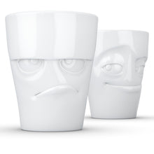 Load image into Gallery viewer, Set of two coffee mugs with &#39;Grumpy&#39; and &#39;Impish&#39; facial expression and 11 oz capacity. From the TASSEN product family of fun dishware by FIFTYEIGHT Products. Tall coffee cups without handles in white, crafted from quality porcelain.
