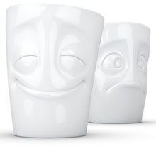 Load image into Gallery viewer, Set of two coffee mugs with &#39;Cheery&#39; and &#39;Baffled&#39; facial expression and 11 oz capacity. From the TASSEN product family of fun dishware by FIFTYEIGHT Products. Tall coffee cups without handles in white, crafted from quality porcelain.
