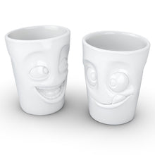 Load image into Gallery viewer, Set of two coffee mugs with &#39;joking&#39; and &#39;tasty&#39; facial expression and 11 oz capacity. From the TASSEN product family of fun dishware by FIFTYEIGHT Products. Tall coffee cups without handles in white, crafted from quality porcelain.
