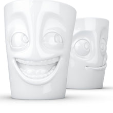 Load image into Gallery viewer, Set of two coffee mugs with &#39;joking&#39; and &#39;tasty&#39; facial expression and 11 oz capacity. From the TASSEN product family of fun dishware by FIFTYEIGHT Products. Tall coffee cups without handles in white, crafted from quality porcelain.
