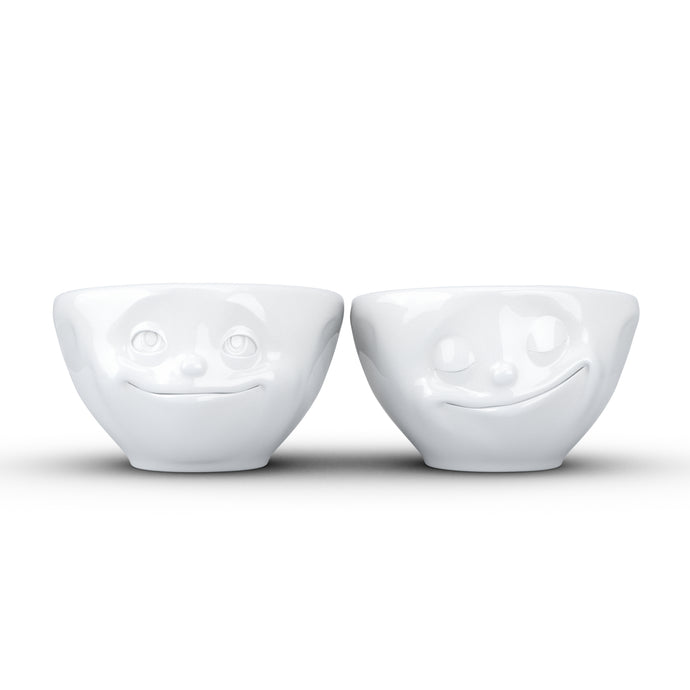 Set of two 3.3 oz. bowls in white featuring sculpted 'happy' and 'dreamy' faces. From the TASSEN product family of fun dishware by FIFTYEIGHT Products. Quality bowl perfect for serving dips, sauces, nuts, sugar, spices, espresso, jam, marmalade, honey, and more.