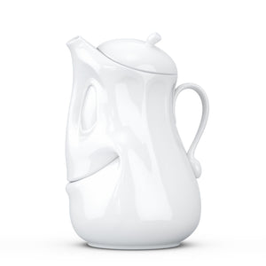 Porcelain tea pot in white featuring a 'good mood' facial expression and a generous 40 oz. capacity. Perfect for serving tea, coffee, punch, mulled wine and more. Detailed facial expression tea pot from the TASSEN product family of fun dishware by FIFTYEIGHT Products. Shipped in exclusively designed gift box.
