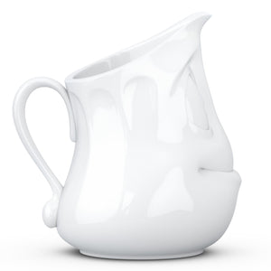 Premium porcelain creamer jug in white features a 'jolly' facial expression at 11 oz capacity. Serves milk, creamer, dressing, salsa, gazpacho, gravy, sauces and more. Detailed facial expression jug from the TASSEN product family of fun dishware by FIFTYEIGHT Products. Shipped in exclusively designed gift box.