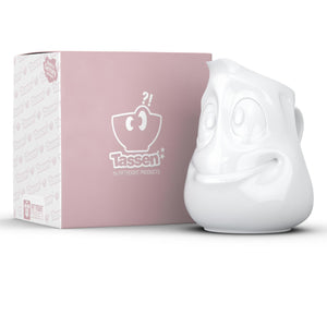 Premium porcelain creamer jug in white features a 'jolly' facial expression at 11 oz capacity. Serves milk, creamer, dressing, salsa, gazpacho, gravy, sauces and more. Detailed facial expression jug from the TASSEN product family of fun dishware by FIFTYEIGHT Products. Shipped in exclusively designed gift box.