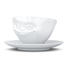 Load image into Gallery viewer, Coffee cup with a &#39;grinning&#39; facial expression and 6.5 oz capacity. From the TASSEN product family of fun dishware by FIFTYEIGHT Products. Coffee cup with matching saucer crafted from quality porcelain.
