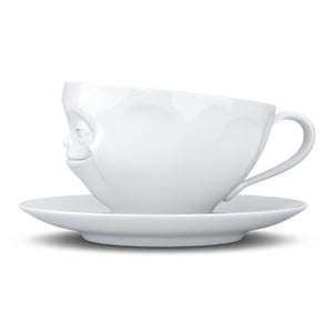 Coffee cup with a 'grinning' facial expression and 6.5 oz capacity. From the TASSEN product family of fun dishware by FIFTYEIGHT Products. Coffee cup with matching saucer crafted from quality porcelain.