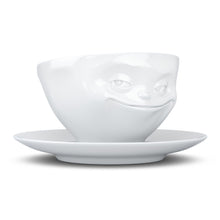 Load image into Gallery viewer, Coffee cup with a &#39;grinning&#39; facial expression and 6.5 oz capacity. From the TASSEN product family of fun dishware by FIFTYEIGHT Products. Coffee cup with matching saucer crafted from quality porcelain.
