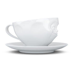 Coffee cup with a 'grinning' facial expression and 6.5 oz capacity. From the TASSEN product family of fun dishware by FIFTYEIGHT Products. Coffee cup with matching saucer crafted from quality porcelain.