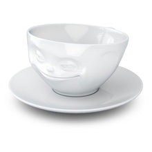 Load image into Gallery viewer, Coffee cup with a &#39;grinning&#39; facial expression and 6.5 oz capacity. From the TASSEN product family of fun dishware by FIFTYEIGHT Products. Coffee cup with matching saucer crafted from quality porcelain.
