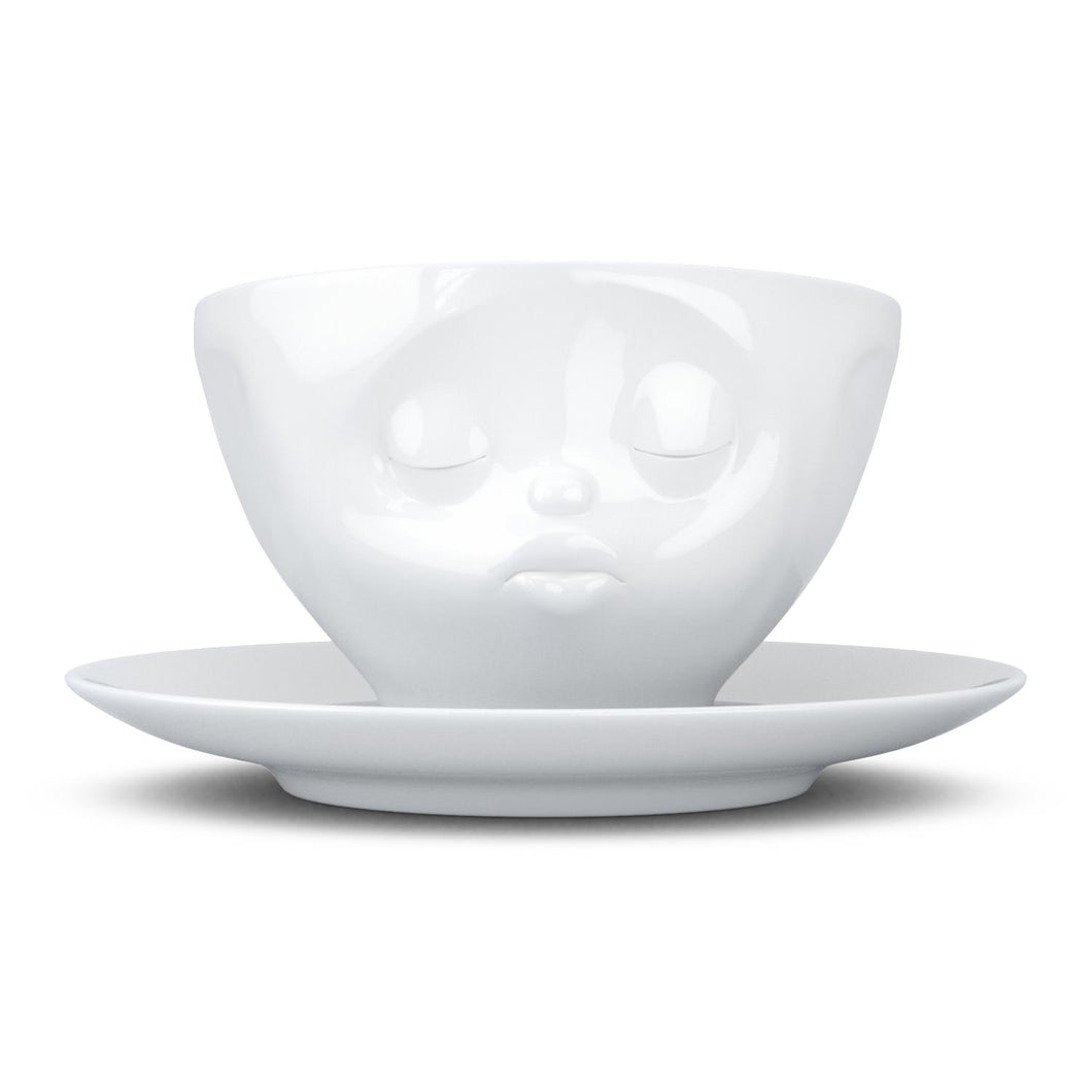 Coffee cup with a 'kissing' facial expression and 6.5 oz capacity. From the TASSEN product family of fun dishware by FIFTYEIGHT Products. Coffee cup with matching saucer crafted from quality porcelain.