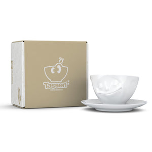 Coffee cup with a 'happy' facial expression and 6.5 oz capacity. From the TASSEN product family of fun dishware by FIFTYEIGHT Products. Coffee cup with matching saucer crafted from quality porcelain.