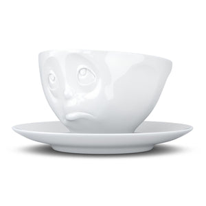 Coffee cup with a 'Oh Please' facial expression and 6.5 oz capacity. From the TASSEN product family of fun dishware by FIFTYEIGHT Products. Coffee cup with matching saucer crafted from quality porcelain.