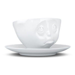 Coffee cup with a 'Oh Please' facial expression and 6.5 oz capacity. From the TASSEN product family of fun dishware by FIFTYEIGHT Products. Coffee cup with matching saucer crafted from quality porcelain.