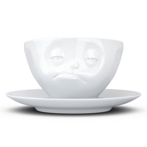 Coffee cup with a 'snoozy' facial expression and 6.5 oz capacity. From the TASSEN product family of fun dishware by FIFTYEIGHT Products. Coffee cup with matching saucer crafted from quality porcelain.