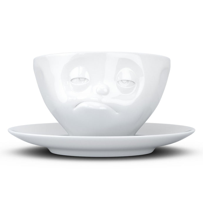 Coffee cup with a 'snoozy' facial expression and 6.5 oz capacity. From the TASSEN product family of fun dishware by FIFTYEIGHT Products. Coffee cup with matching saucer crafted from quality porcelain.