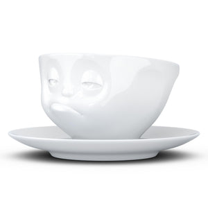 Coffee cup with a 'snoozy' facial expression and 6.5 oz capacity. From the TASSEN product family of fun dishware by FIFTYEIGHT Products. Coffee cup with matching saucer crafted from quality porcelain.