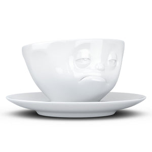 Coffee cup with a 'snoozy' facial expression and 6.5 oz capacity. From the TASSEN product family of fun dishware by FIFTYEIGHT Products. Coffee cup with matching saucer crafted from quality porcelain.