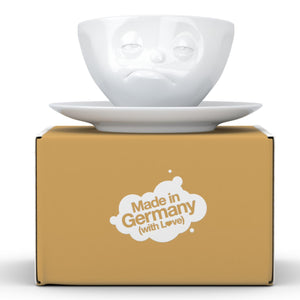 Coffee cup with a 'snoozy' facial expression and 6.5 oz capacity. From the TASSEN product family of fun dishware by FIFTYEIGHT Products. Coffee cup with matching saucer crafted from quality porcelain.