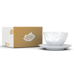 Coffee cup with a 'snoozy' facial expression and 6.5 oz capacity. From the TASSEN product family of fun dishware by FIFTYEIGHT Products. Coffee cup with matching saucer crafted from quality porcelain.