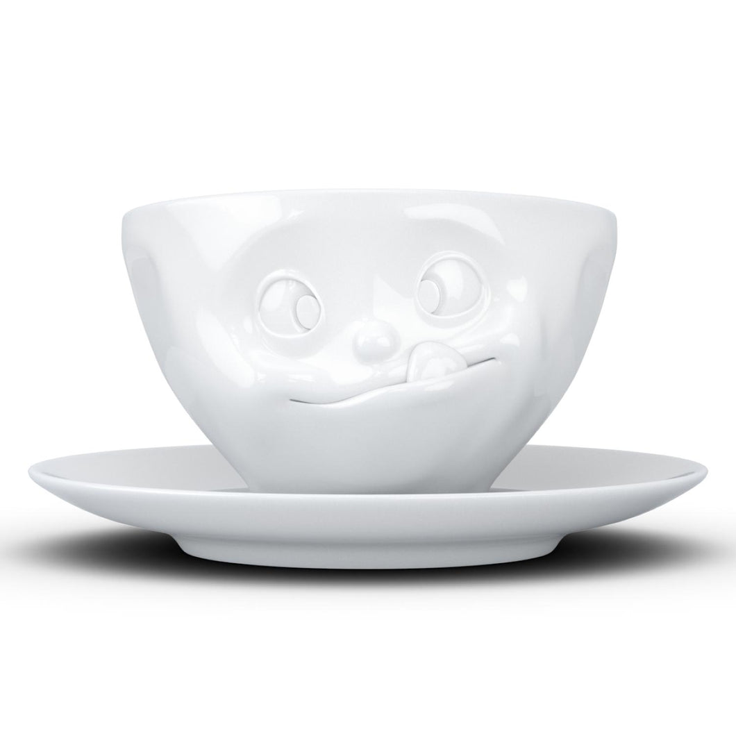 Coffee cup with a 'tasty' facial expression and 6.5 oz capacity. From the TASSEN product family of fun dishware by FIFTYEIGHT Products. Coffee cup with matching saucer crafted from quality porcelain.