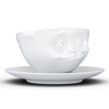 Load image into Gallery viewer, Coffee cup with a &#39;tasty&#39; facial expression and 6.5 oz capacity. From the TASSEN product family of fun dishware by FIFTYEIGHT Products. Coffee cup with matching saucer crafted from quality porcelain.
