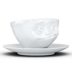 Coffee cup with a 'tasty' facial expression and 6.5 oz capacity. From the TASSEN product family of fun dishware by FIFTYEIGHT Products. Coffee cup with matching saucer crafted from quality porcelain.