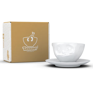 Coffee cup with a 'tasty' facial expression and 6.5 oz capacity. From the TASSEN product family of fun dishware by FIFTYEIGHT Products. Coffee cup with matching saucer crafted from quality porcelain.