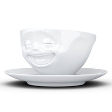 Load image into Gallery viewer, Coffee cup with a &#39;laughing&#39; facial expression and 6.5 oz capacity. From the TASSEN product family of fun dishware by FIFTYEIGHT Products. Coffee cup with matching saucer crafted from quality porcelain.
