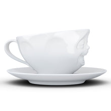 Load image into Gallery viewer, Coffee cup with a &#39;laughing&#39; facial expression and 6.5 oz capacity. From the TASSEN product family of fun dishware by FIFTYEIGHT Products. Coffee cup with matching saucer crafted from quality porcelain.
