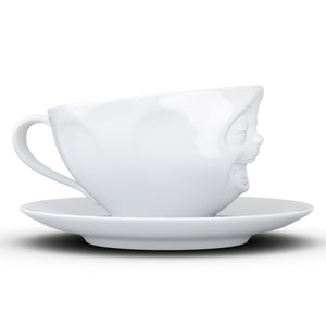 Coffee cup with a 'laughing' facial expression and 6.5 oz capacity. From the TASSEN product family of fun dishware by FIFTYEIGHT Products. Coffee cup with matching saucer crafted from quality porcelain.