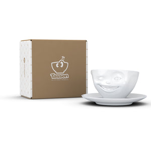 Coffee cup with a 'winking' facial expression and 6.5 oz capacity. From the TASSEN product family of fun dishware by FIFTYEIGHT Products. Coffee cup with matching saucer crafted from quality porcelain.